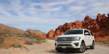 parked white Ford Explorer SUV