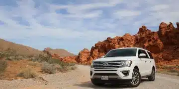 parked white Ford Explorer SUV