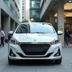 Peugeot 208 blanche garée en ville, vue trois quarts avant pour illustrer les motorisations disponibles