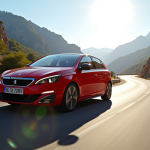 Peugeot 308 GTI rouge en pleine vitesse sur une route de montagne