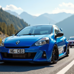 Renault Clio 2 RS sur route de montagne ensoleillee