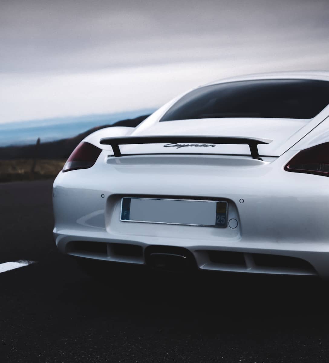 white porsche 911 on road